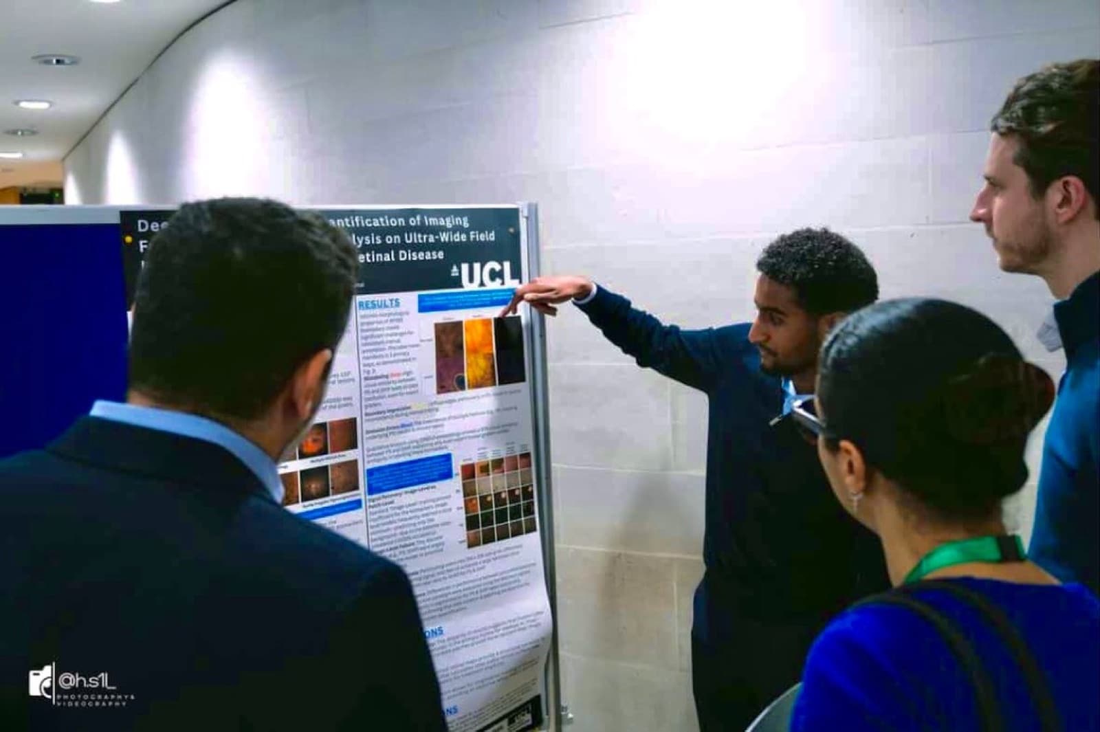 Ahmad Abdelaal presenting a medical AI research poster